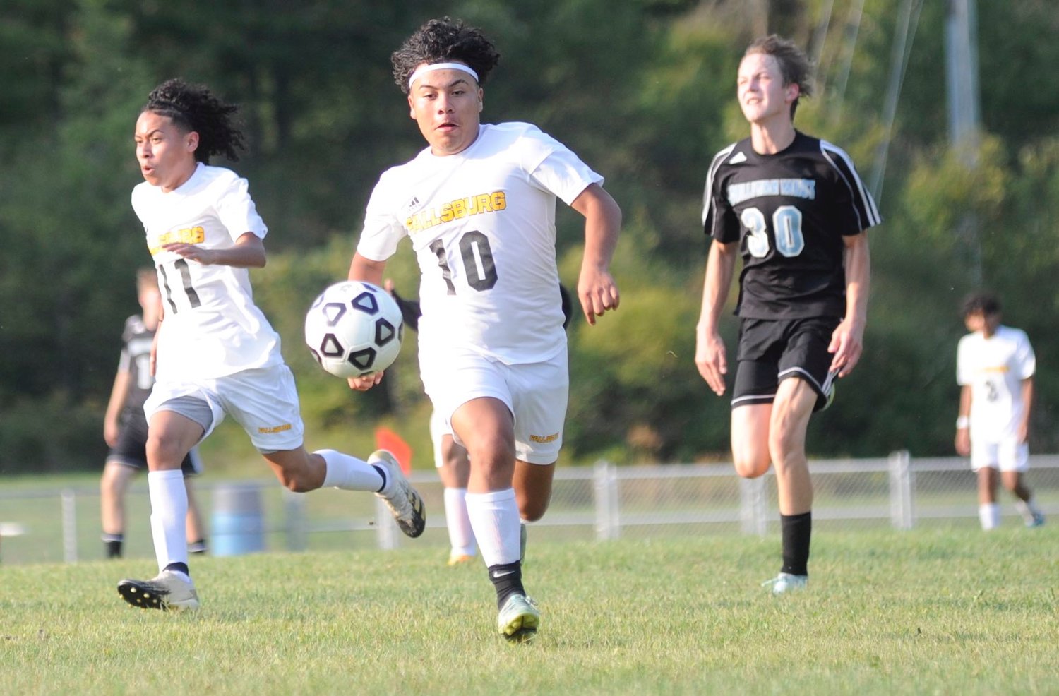Headed for a “hat trick.” Fallsburg’s Diego Bonilla scored three goals during the match, thus posting a hat trick in the 7-0 win over the home team. He is flanked by teammate Jose Perez and Sullivan West’s Brodey Herbert.